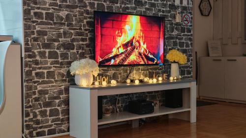 Et tv og/eller underholdning på Dream Rental Pirot Apartman