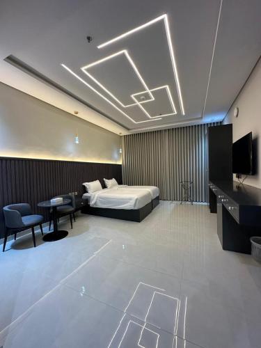 En eller flere senge i et værelse på سرايا بلقيس الاولى للشقق المخدومة