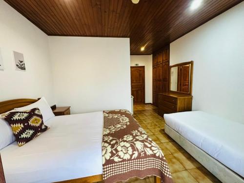 En eller flere senge i et værelse på Geres Mountain View Guest House