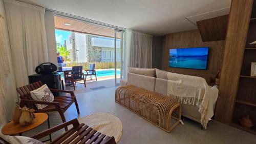 TV a/nebo společenská místnost v ubytování Casa Brisa Cond Naluum by ReservaMilagres