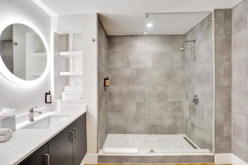a bathroom with a shower and a sink at Bright Studio at The Arya City and Bay Access in Miami