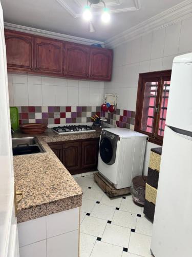 Køkken eller tekøkken på Petit Apparemment pas chère à 3km du grand stade de rabat