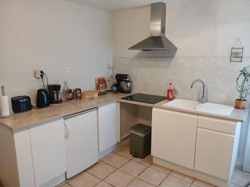 Küche/Küchenzeile in der Unterkunft Maison de ville