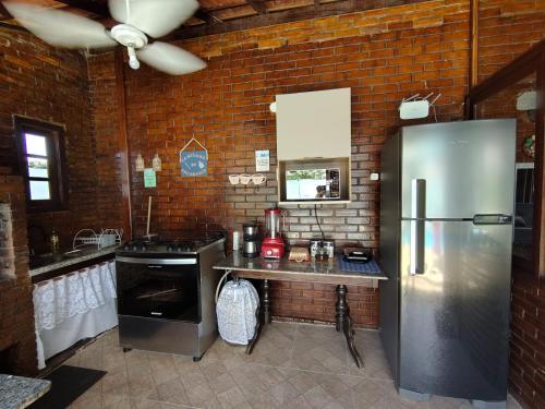 Kuchyň nebo kuchyňský kout v ubytování Chalé da Serra Miguel Pereira