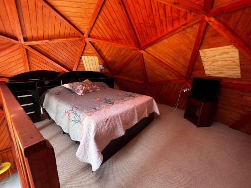 En eller flere senge i et værelse på Domo Algarrobo Bosque y Mar