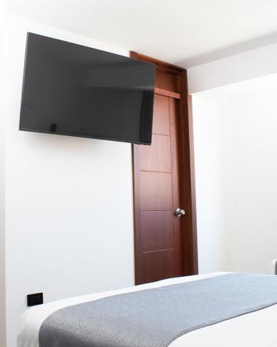 Hotel Llampayec TV 또는 엔터테인먼트 센터
