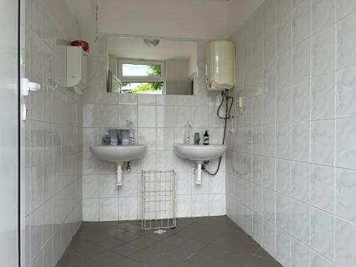 Koupelna v ubytování Rekreační chatky na Fotbalovém stadionu Senec