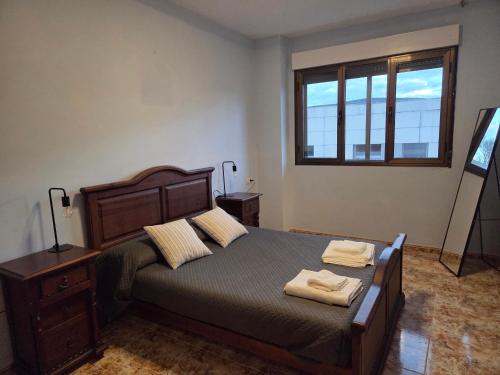 En eller flere senge i et værelse på Casa Alba