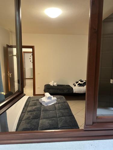 Llit o llits en una habitació de SognaRE appartament