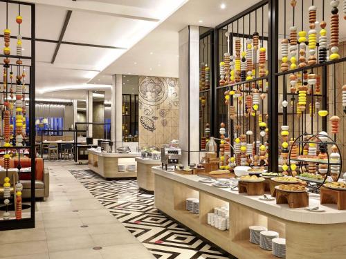 a store lobby with a display of food at Ibis Samarinda in Samarinda