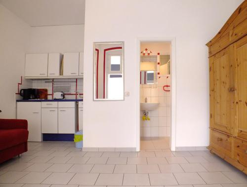 Kuchyň nebo kuchyňský kout v ubytování Villa Mutabor