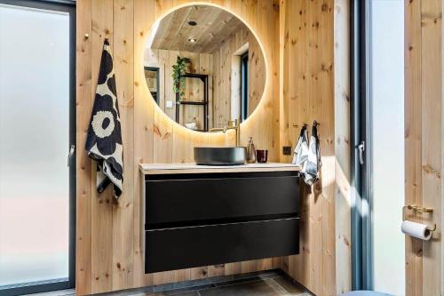 a bathroom with a sink and a mirror at 157-Thisted-Isfuglevej-17 in Thisted