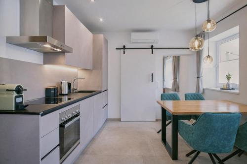 Kuchyň nebo kuchyňský kout v ubytování ALP'N SOUL - AlpenLuxus Collection