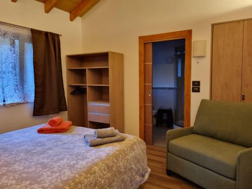 En eller flere senge i et værelse på Cá du Mattu