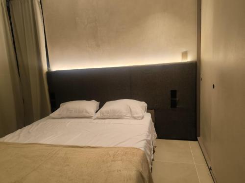 En eller flere senge i et værelse på Apartamento minimalista norte armenia