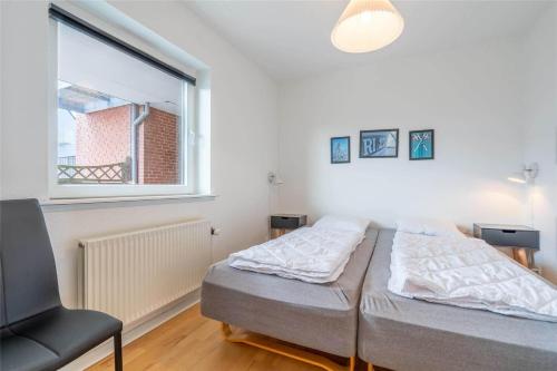 En eller flere senge i et værelse på 894-Hvide-Sande-Bredgade-1-nr-4