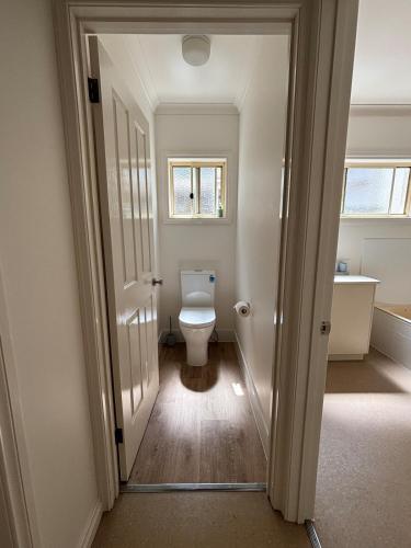 a small bathroom with a toilet in a room at The Terrace - Echuca in Echuca