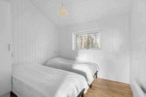 En eller flere senge i et værelse på 2309-Stege-Enebaerstien-39