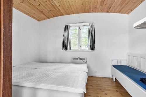 Postel nebo postele na pokoji v ubytování 8148-Praesto-Anemonevej-8