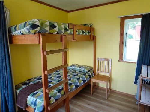 En eller flere senge i et værelse på The Sandcastle