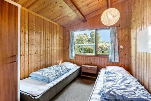 En eller flere senge i et værelse på 1072-Stege-Fuksiavej-8