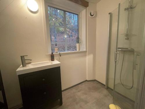 Et badeværelse på 4 star holiday home in UDDEVALLA