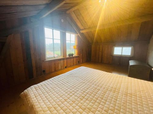 En eller flere senge i et værelse på 4 star holiday home in UDDEVALLA