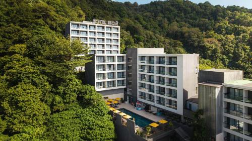 an aerial view of a hotel in the mountains at Hotel IKON Phuket - SHA Extra Plus in Karon Beach