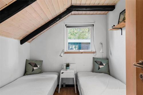 En eller flere senge i et værelse på HA194-Hals-Sdr-Smalbyvej-25