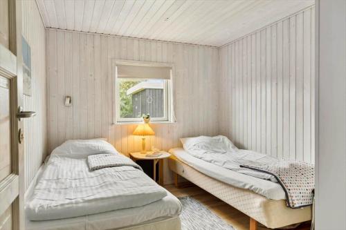En eller flere senge i et værelse på HA362-Saeby-Kattegatsvej-10