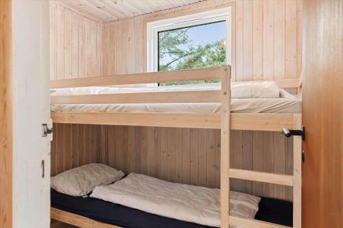 En eller flere senge i et værelse på HA374-Saeby-Klitvej-12