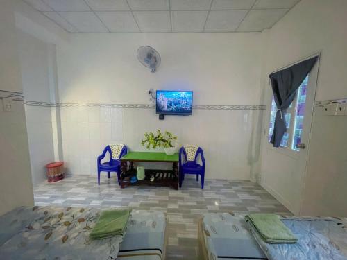 Et tv og/eller underholdning på Nhà Nghỉ Thiên Thanh Long Hải