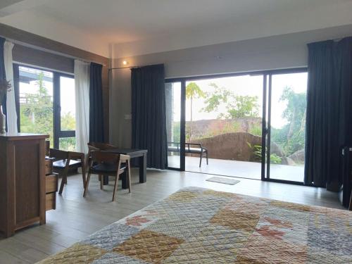 En eller flere senge i et værelse på Globiquex hotels, Phu quoc