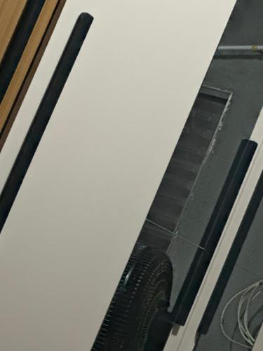 a close up of an oven with its door open at Casa bosque in São Paulo