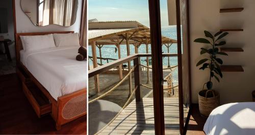 a bedroom with a bed and a view of the ocean at The Ohm At Thomas Beach in Uluwatu