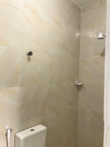 Phòng tắm tại Suítes Som do Mar