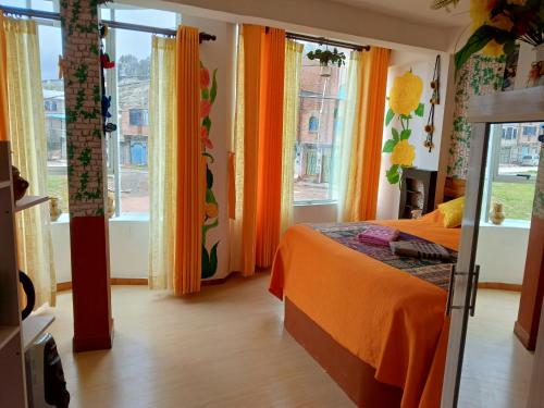 Een bed of bedden in een kamer bij Jardín Andino Hostal