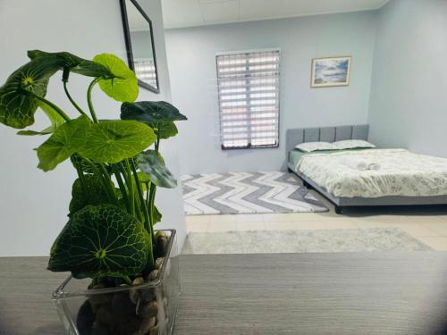 Postel nebo postele na pokoji v ubytování Nawra Iman Bayu Homestay