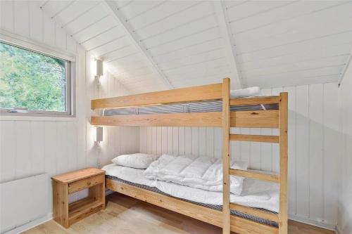 En eller flere senge i et værelse på 11118-Nykobing-Sj-Stranderbovej-33