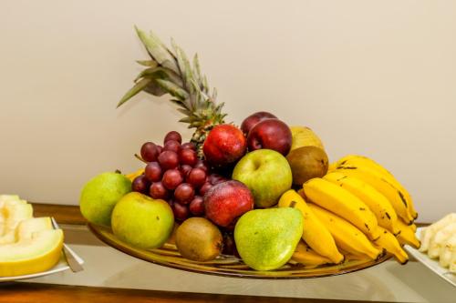 a basket of fruit sitting on a table at Hotel Gramado Interlaken in Gramado