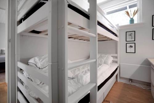 En eller flere senge i et værelse på 10034-Rorvig-Hojvaenget-2