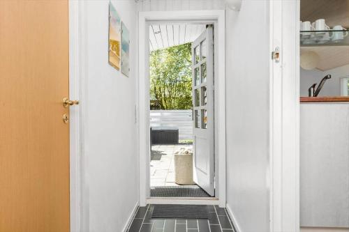 a hallway with a door leading into a house at LF21632-Spottrup-Rylevej-1 in Spottrup
