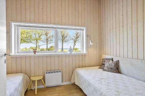 En eller flere senge i et værelse på LF14038-Roslev-Stranddalen-119