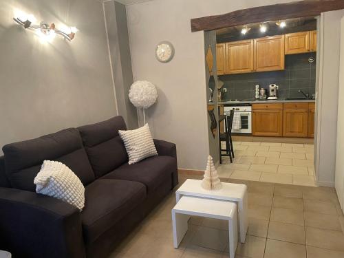 Kuchyň nebo kuchyňský kout v ubytování À l'improviste est une maison individuelle