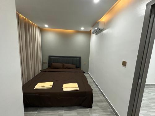 Postel nebo postele na pokoji v ubytování Sen Sok Condominium 1 bedrm apt