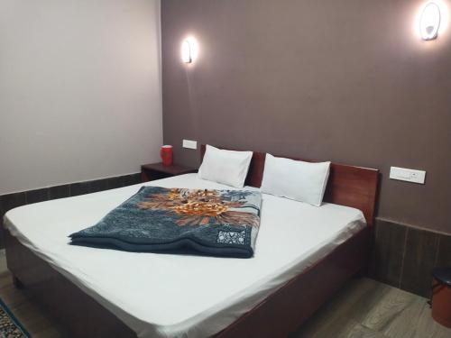 Postel nebo postele na pokoji v ubytování Hill Inn Rooms an HomeStay