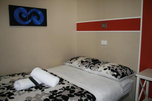 Ένα ή περισσότερα κρεβάτια σε δωμάτιο στο Astray Motel