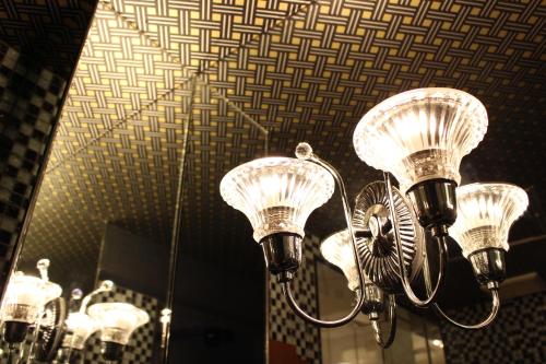 a group of chandeliers hanging from a ceiling at ホテル アンジュエトワール 堺 - Adult Only in Sakai