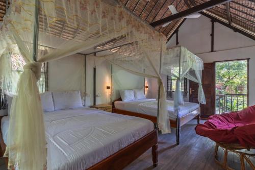 Postel nebo postele na pokoji v ubytování Nary Garden