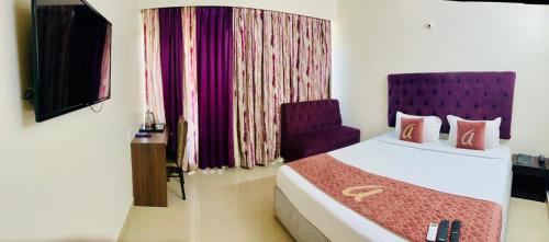 En eller flere senge i et værelse på Astra Hotels & Suites - HSR Layout Sector 1, Near Ecospace Bellandur